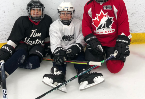 Female hockey players from the Female Indigenous Hockey Program